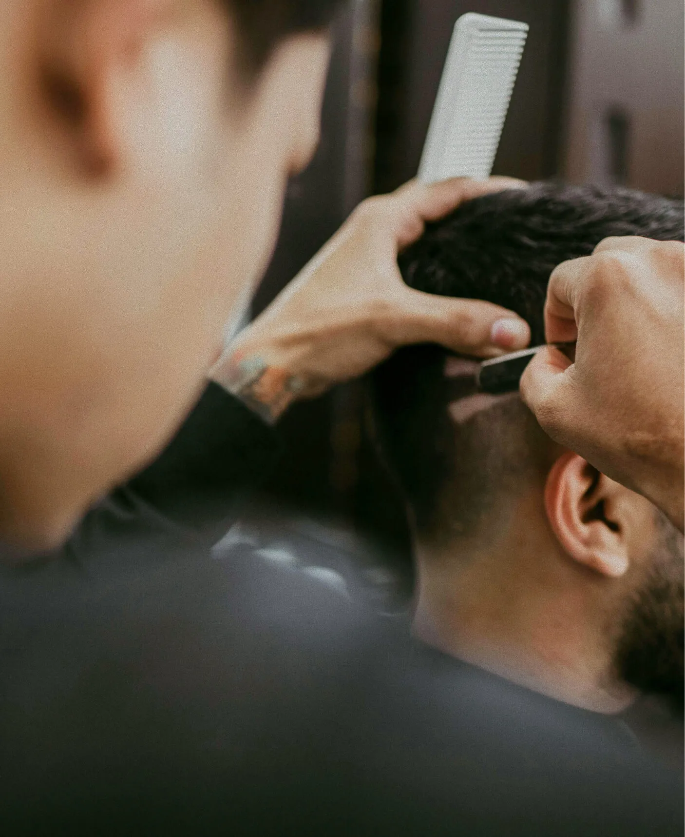 A man receiving a haircut 